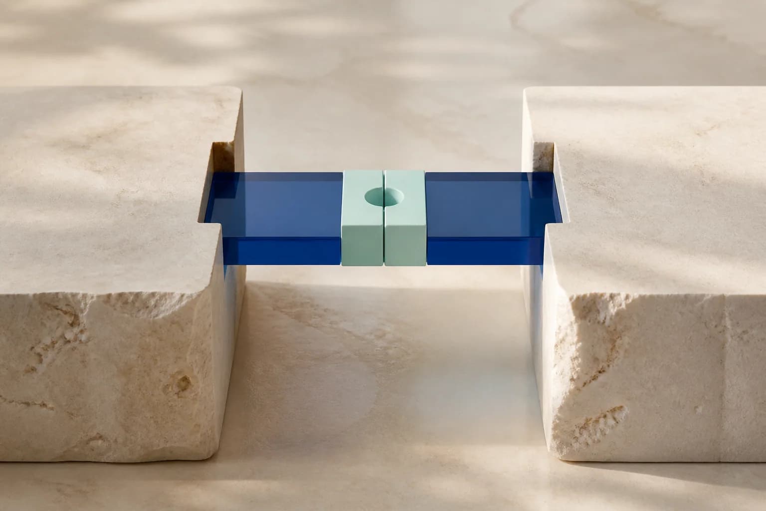 Two stone operating bases joined by a shared cobalt bridge